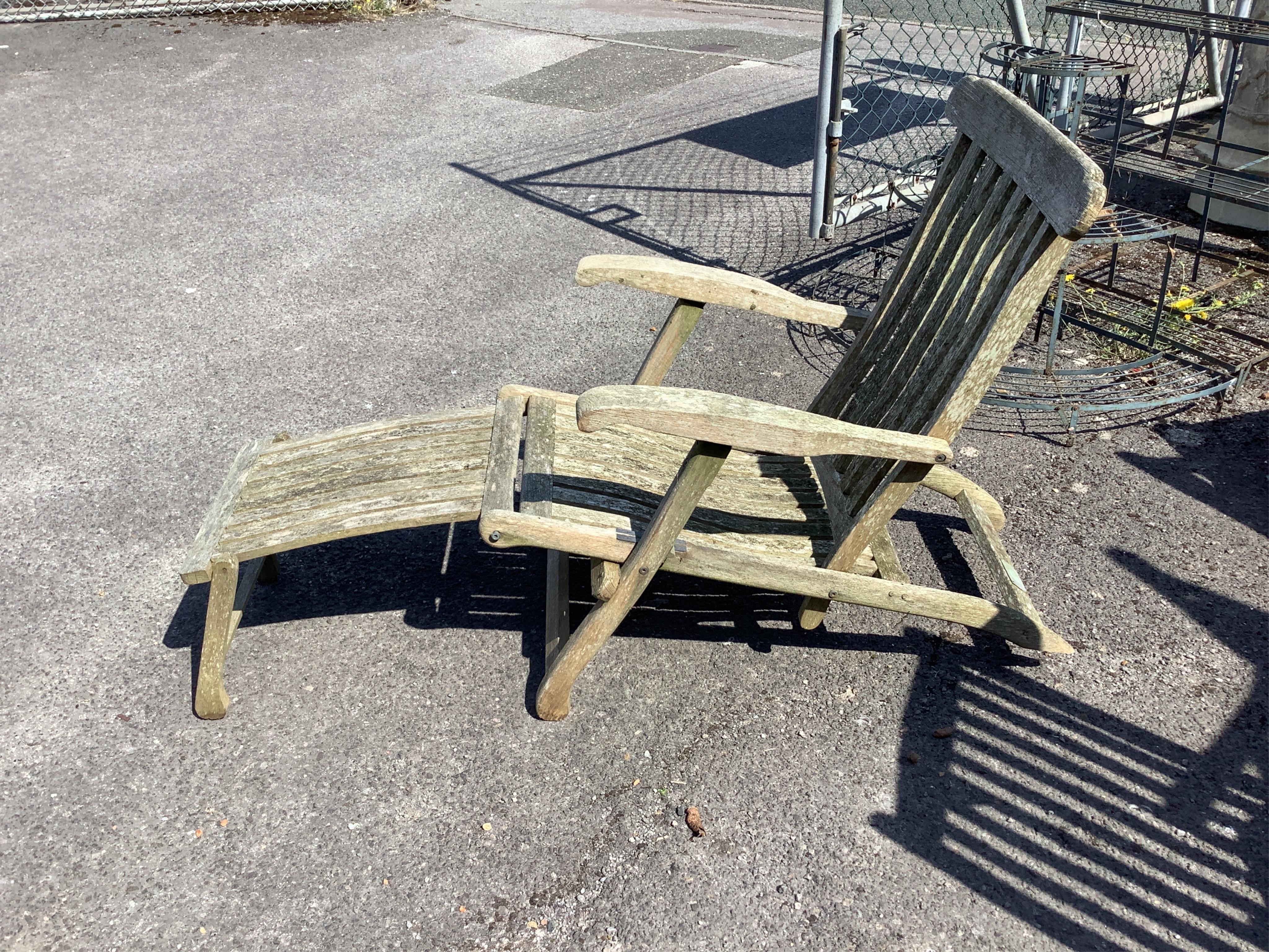 Two weathered teak folding garden steamer chairs, (one a.f.). Condition - poor